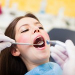 Dentist doing a dental treatment